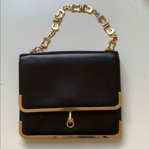 Vintage clutch with golden lining and handle